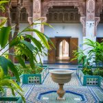 Oriental artwork and ornate decoration in the inner court of Bahia palace (open to the public) in the Medina of Marrakech, Morocco.