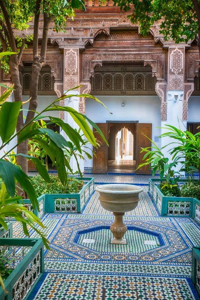 Oriental artwork and ornate decoration in the inner court of Bahia palace (open to the public) in the Medina of Marrakech, Morocco.